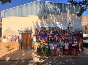 Talleres de Carmen de Burgos con un mural de Mujeres Rurales en Alhabia